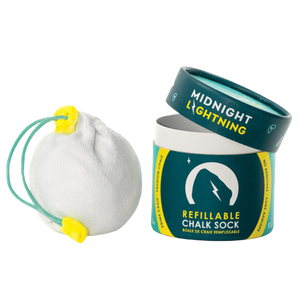 A cylindrical container labeled "Packaged Chalk Sock by Midnight Lightning" holds a refillable chalk sock, used for climbing or gym activities. The sock is white with yellow and teal pull strings. The container's design includes a lightning bolt symbol and teal and yellow color scheme.